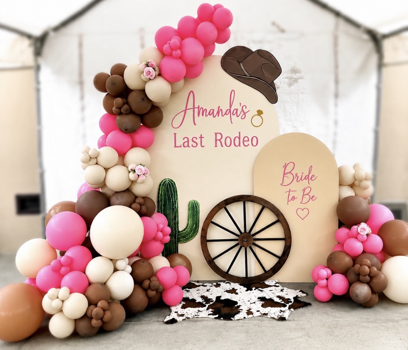 Pink cowgirl bridal shower balloon installation by Joy Balloonss