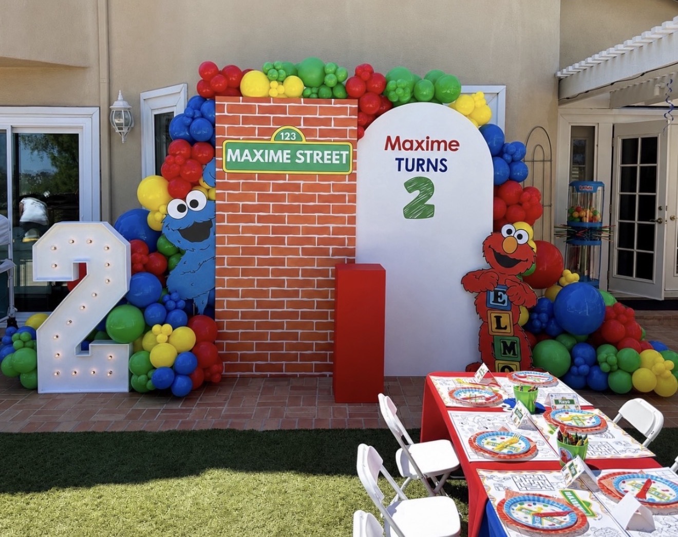 Colorful Sesame Street second birthday setup