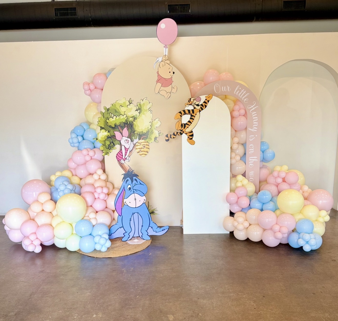 Pastel Winnie the Pooh balloon backdrop